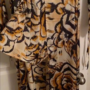 Maxi length dress with attached romper.